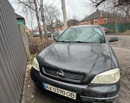 Черный Опель Астра, объемом двигателя 1.4 л и пробегом 210 тыс. км за 1500 $, фото 1 на Automoto.ua