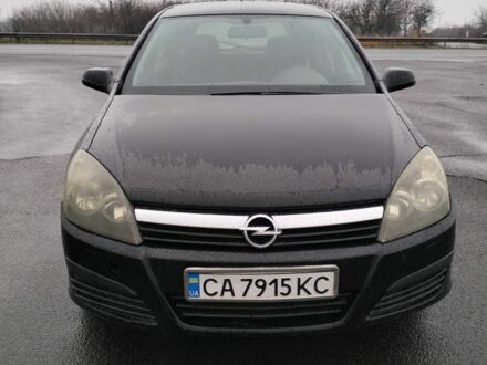 Черный Опель Астра, объемом двигателя 1.2 л и пробегом 300 тыс. км за 3800 $, фото 1 на Automoto.ua