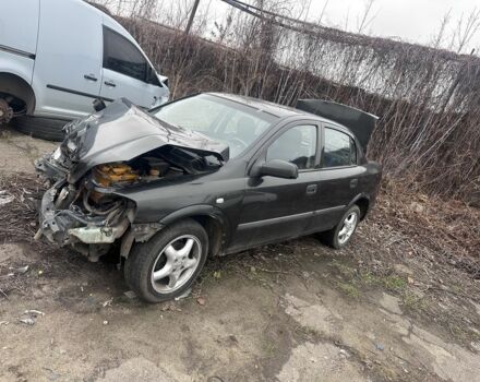 Черный Опель Астра, объемом двигателя 1.4 л и пробегом 150 тыс. км за 900 $, фото 1 на Automoto.ua