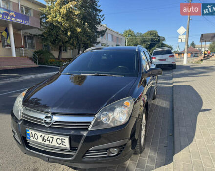 Черный Опель Астра, объемом двигателя 1.69 л и пробегом 275 тыс. км за 4500 $, фото 1 на Automoto.ua