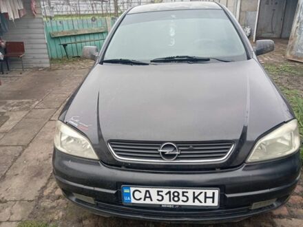 Черный Опель Астра, объемом двигателя 1.4 л и пробегом 280 тыс. км за 3700 $, фото 1 на Automoto.ua