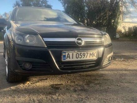 Черный Опель Астра, объемом двигателя 1.9 л и пробегом 266 тыс. км за 5000 $, фото 1 на Automoto.ua