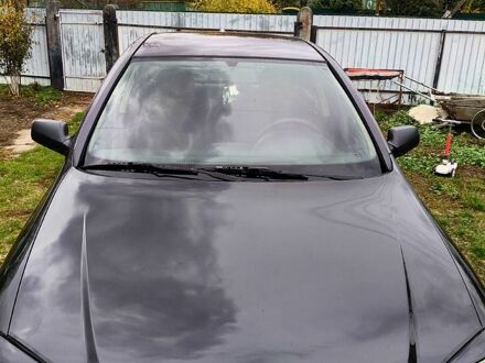 Черный Опель Астра, объемом двигателя 1.4 л и пробегом 412 тыс. км за 3100 $, фото 1 на Automoto.ua