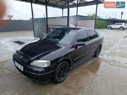 Черный Опель Астра, объемом двигателя 1.6 л и пробегом 147 тыс. км за 2700 $, фото 1 на Automoto.ua