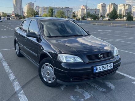 Черный Опель Астра, объемом двигателя 1.4 л и пробегом 210 тыс. км за 3597 $, фото 1 на Automoto.ua