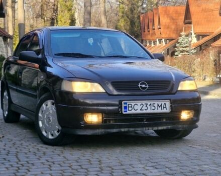 Черный Опель Астра, объемом двигателя 1.39 л и пробегом 251 тыс. км за 2999 $, фото 1 на Automoto.ua