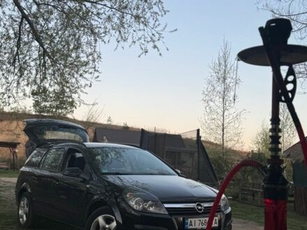 Черный Опель Астра, объемом двигателя 0 л и пробегом 230 тыс. км за 5500 $, фото 1 на Automoto.ua