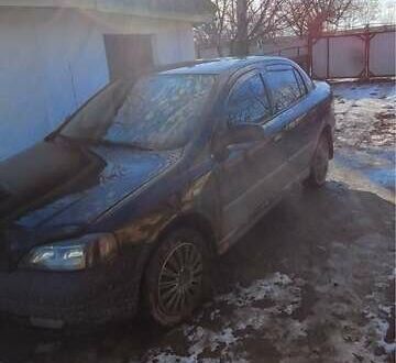 Черный Опель Астра, объемом двигателя 1.4 л и пробегом 230 тыс. км за 3100 $, фото 1 на Automoto.ua