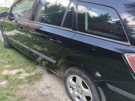 Черный Опель Астра, объемом двигателя 1.3 л и пробегом 268 тыс. км за 4550 $, фото 1 на Automoto.ua