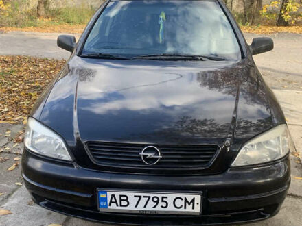 Черный Опель Астра, объемом двигателя 1.4 л и пробегом 216 тыс. км за 3500 $, фото 1 на Automoto.ua