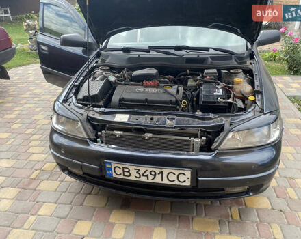 Черный Опель Астра, объемом двигателя 1.6 л и пробегом 250 тыс. км за 3300 $, фото 1 на Automoto.ua