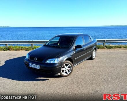 Черный Опель Астра, объемом двигателя 1.6 л и пробегом 270 тыс. км за 4000 $, фото 1 на Automoto.ua