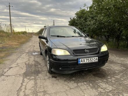 Черный Опель Астра, объемом двигателя 1.4 л и пробегом 1000 тыс. км за 2500 $, фото 1 на Automoto.ua