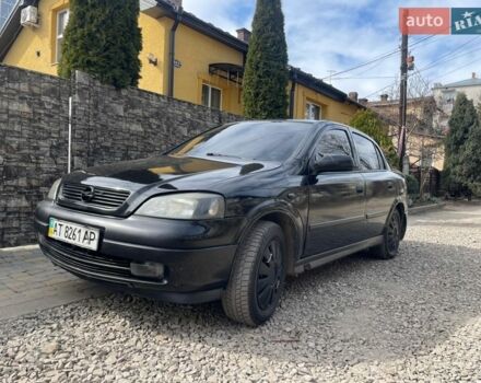 Черный Опель Астра, объемом двигателя 1.4 л и пробегом 280 тыс. км за 2700 $, фото 1 на Automoto.ua