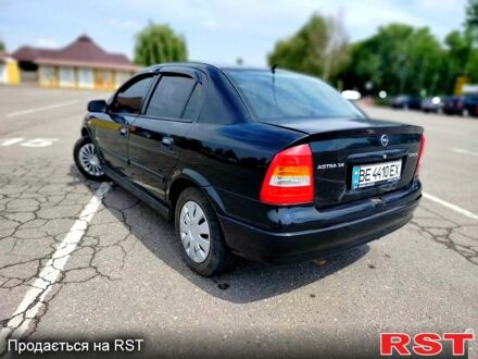 Черный Опель Астра, объемом двигателя 1.4 л и пробегом 320 тыс. км за 3300 $, фото 1 на Automoto.ua