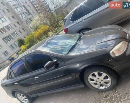 Черный Опель Астра, объемом двигателя 1.4 л и пробегом 180 тыс. км за 3000 $, фото 1 на Automoto.ua