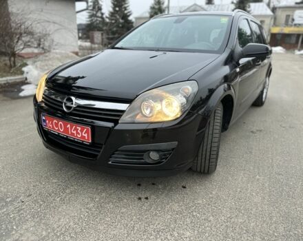 Черный Опель Астра, объемом двигателя 1.6 л и пробегом 210 тыс. км за 5250 $, фото 1 на Automoto.ua