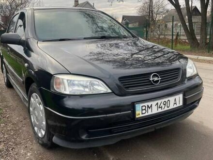 Черный Опель Астра, объемом двигателя 1.36 л и пробегом 135 тыс. км за 3400 $, фото 1 на Automoto.ua