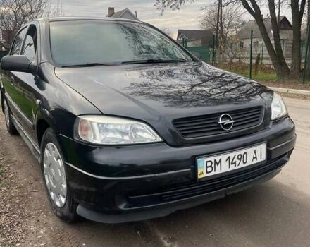 Черный Опель Астра, объемом двигателя 1.36 л и пробегом 135 тыс. км за 3400 $, фото 1 на Automoto.ua