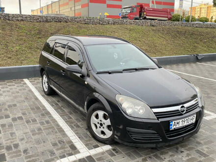 Черный Опель Астра, объемом двигателя 1.25 л и пробегом 202 тыс. км за 4500 $, фото 1 на Automoto.ua