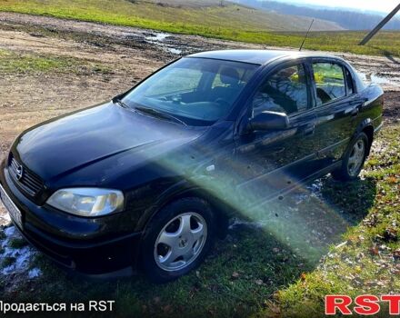 Черный Опель Астра, объемом двигателя 1.4 л и пробегом 200 тыс. км за 3350 $, фото 1 на Automoto.ua