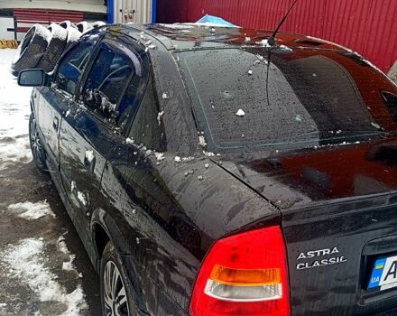 Черный Опель Астра, объемом двигателя 1.4 л и пробегом 150 тыс. км за 1900 $, фото 1 на Automoto.ua