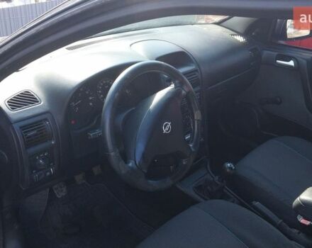 Черный Опель Астра, объемом двигателя 1.4 л и пробегом 150 тыс. км за 4200 $, фото 1 на Automoto.ua