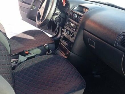 Черный Опель Астра, объемом двигателя 1.4 л и пробегом 270 тыс. км за 3100 $, фото 1 на Automoto.ua