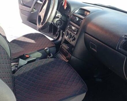 Черный Опель Астра, объемом двигателя 1.4 л и пробегом 270 тыс. км за 3100 $, фото 1 на Automoto.ua