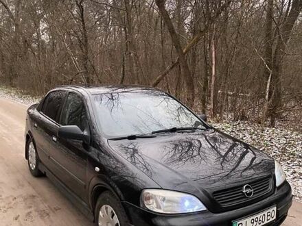 Черный Опель Астра, объемом двигателя 1.4 л и пробегом 160 тыс. км за 3500 $, фото 1 на Automoto.ua