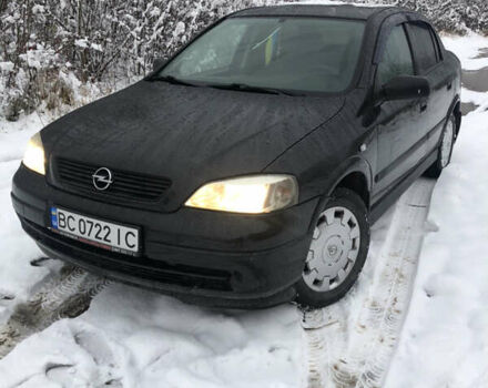 Черный Опель Астра, объемом двигателя 1.39 л и пробегом 161 тыс. км за 3000 $, фото 1 на Automoto.ua