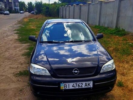 Черный Опель Астра, объемом двигателя 1.4 л и пробегом 141 тыс. км за 4000 $, фото 1 на Automoto.ua