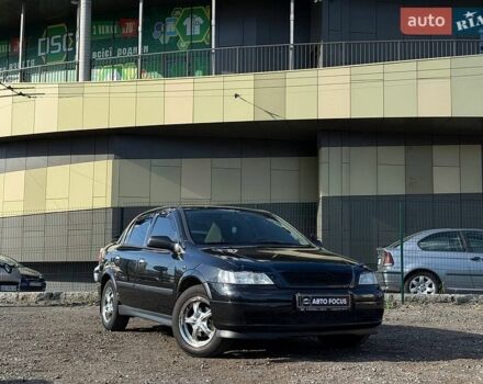 Черный Опель Астра, объемом двигателя 1.39 л и пробегом 260 тыс. км за 3790 $, фото 1 на Automoto.ua