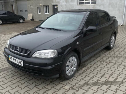 Черный Опель Астра, объемом двигателя 1.4 л и пробегом 229 тыс. км за 3200 $, фото 1 на Automoto.ua