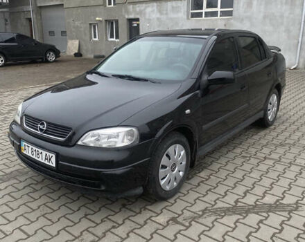 Черный Опель Астра, объемом двигателя 1.4 л и пробегом 229 тыс. км за 3200 $, фото 1 на Automoto.ua