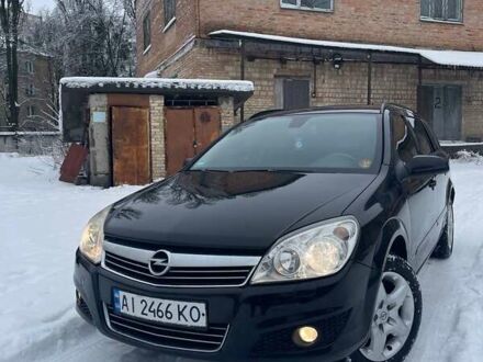 Черный Опель Астра, объемом двигателя 1.6 л и пробегом 322 тыс. км за 5000 $, фото 1 на Automoto.ua