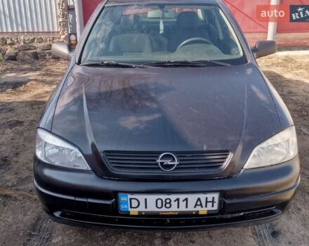 Черный Опель Астра, объемом двигателя 1.4 л и пробегом 173 тыс. км за 2100 $, фото 1 на Automoto.ua