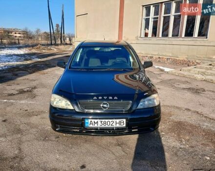 Черный Опель Астра, объемом двигателя 1.4 л и пробегом 212 тыс. км за 3850 $, фото 1 на Automoto.ua