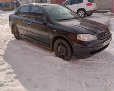 Черный Опель Астра, объемом двигателя 1.4 л и пробегом 173 тыс. км за 2300 $, фото 1 на Automoto.ua