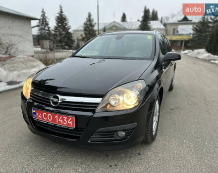 Черный Опель Астра, объемом двигателя 1.6 л и пробегом 210 тыс. км за 5200 $, фото 1 на Automoto.ua