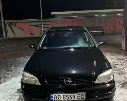 Черный Опель Астра, объемом двигателя 1.4 л и пробегом 338 тыс. км за 2300 $, фото 1 на Automoto.ua