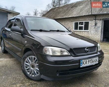 Черный Опель Астра, объемом двигателя 1.4 л и пробегом 250 тыс. км за 3999 $, фото 1 на Automoto.ua