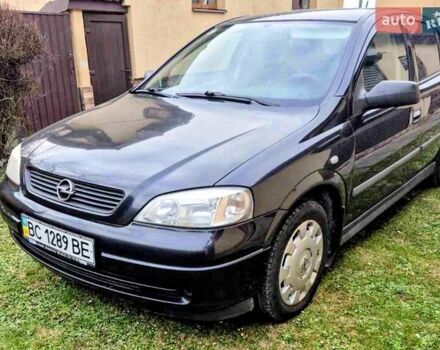 Черный Опель Астра, объемом двигателя 1.4 л и пробегом 160 тыс. км за 4300 $, фото 1 на Automoto.ua