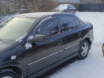 Черный Опель Астра, объемом двигателя 1.4 л и пробегом 160 тыс. км за 4200 $, фото 1 на Automoto.ua