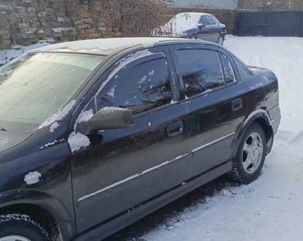 Черный Опель Астра, объемом двигателя 1.4 л и пробегом 160 тыс. км за 4200 $, фото 1 на Automoto.ua