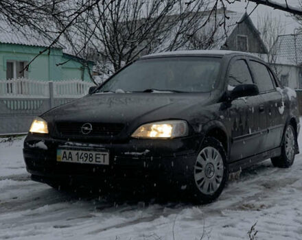 Черный Опель Астра, объемом двигателя 1.4 л и пробегом 260 тыс. км за 3300 $, фото 1 на Automoto.ua
