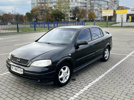 Черный Опель Астра, объемом двигателя 1.4 л и пробегом 210 тыс. км за 3800 $, фото 1 на Automoto.ua