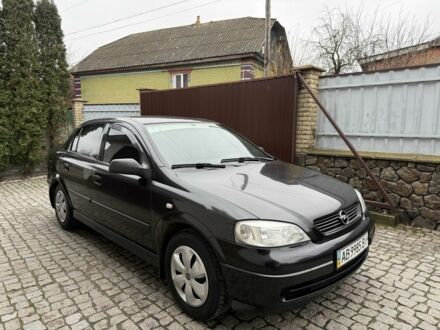 Черный Опель Астра, объемом двигателя 1.4 л и пробегом 160 тыс. км за 4000 $, фото 1 на Automoto.ua