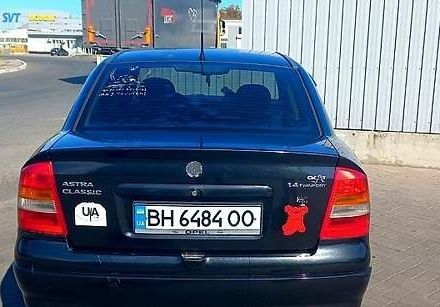 Черный Опель Астра, объемом двигателя 1.4 л и пробегом 290 тыс. км за 4300 $, фото 1 на Automoto.ua