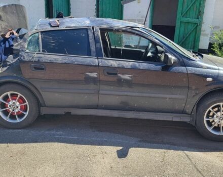 Черный Опель Астра, объемом двигателя 1.6 л и пробегом 254 тыс. км за 903 $, фото 1 на Automoto.ua